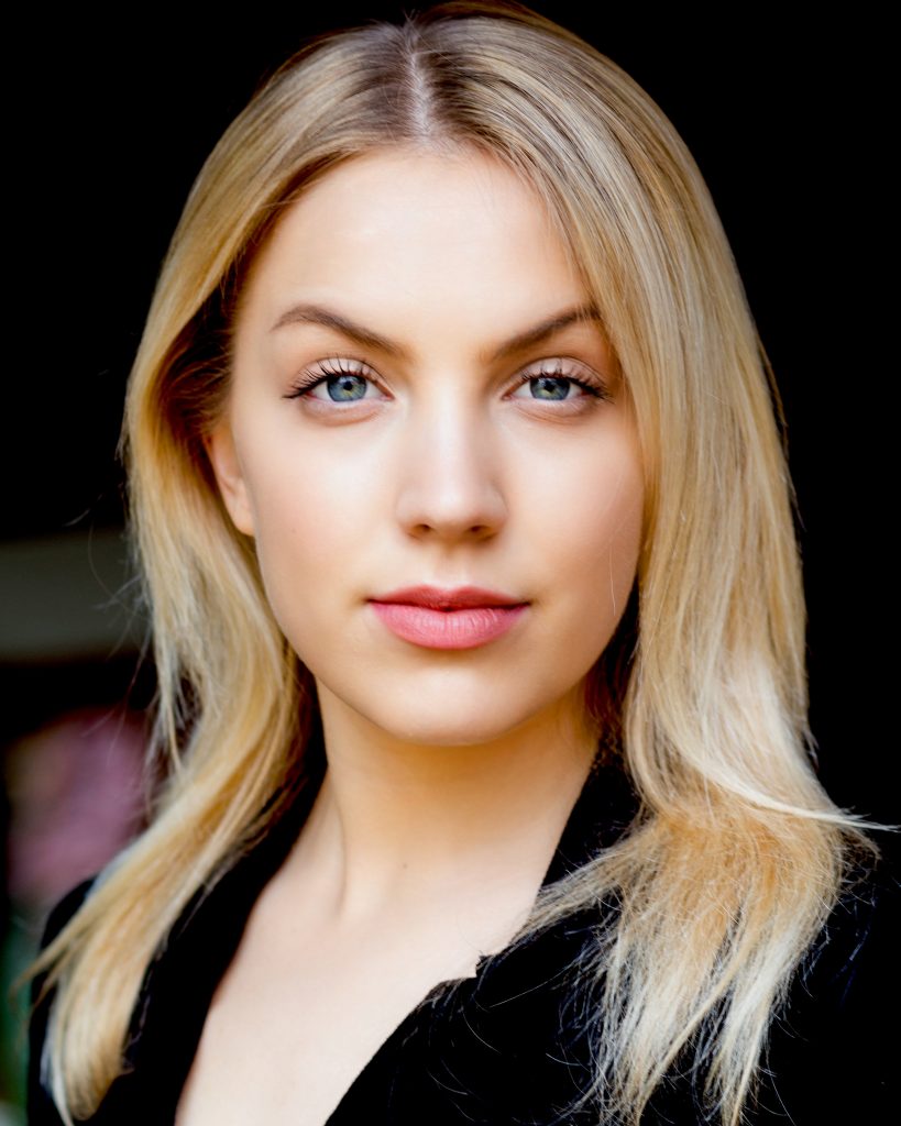 Beautiful blonde actress with blue eyes