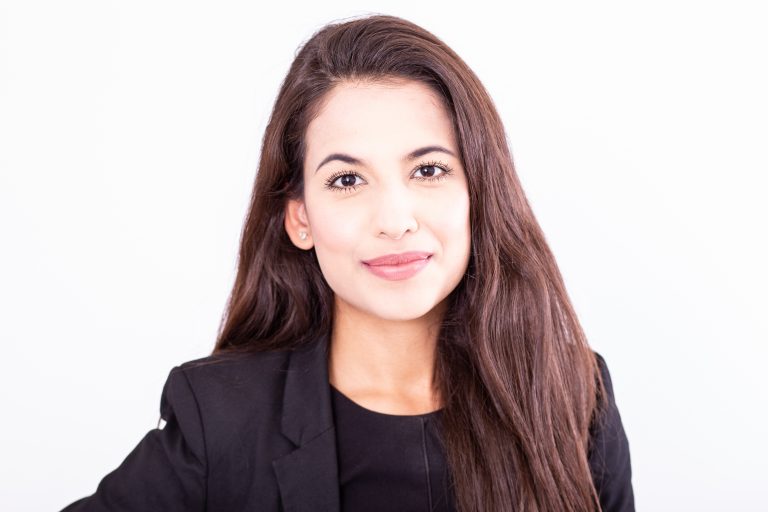 Lawyer woman with brown hair and black suit